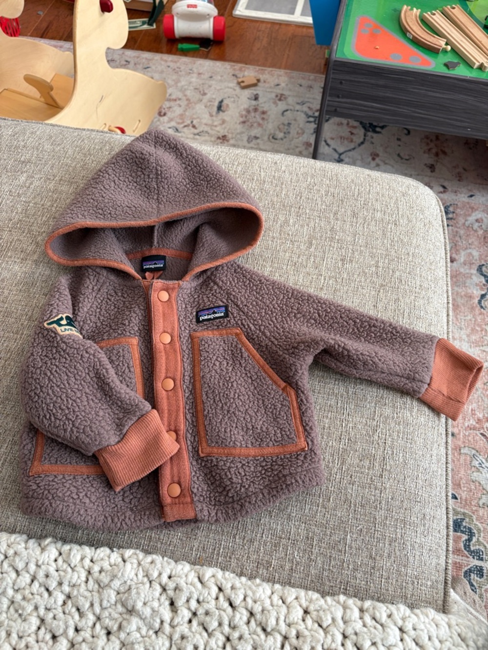 Patagonia brown toddler sherpa hoodie with rust trim